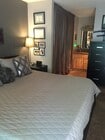 large Master bedroom w/view of yard and vanity - 9175 Campina Dr Unit #12