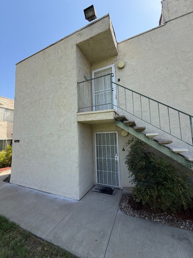 Building Photo - 2BR/1BA Lakeside ground floor condo with 1 car detached garage, 1 uncovered parking space & commu... Unit A