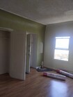 Living Room - 2102 W 48th St Apartments
