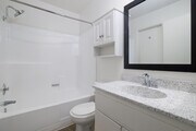 2BR, 1.5BA - 951SF - Primary Bathroom - Northwoods