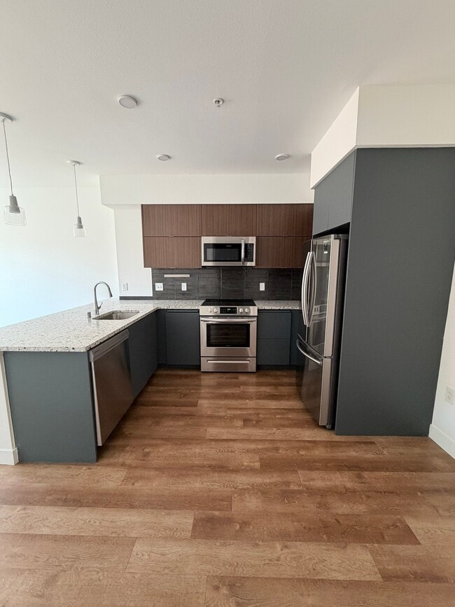 Building Photo - 2880 James M Wood Blvd Unit 310