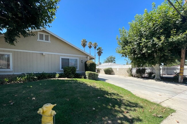Driveway street entrance to Eucalyptus Apartments in Moreno Valley, California. - Eucalyptus Apartments
