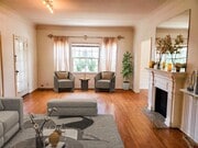 LIVING ROOM - 6328 Orange St Apartments Unit Upper Rear