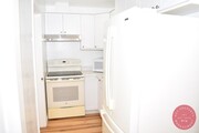 Photo - Charming Two-Bedroom, One-Bath Condo Unit – Avai...
