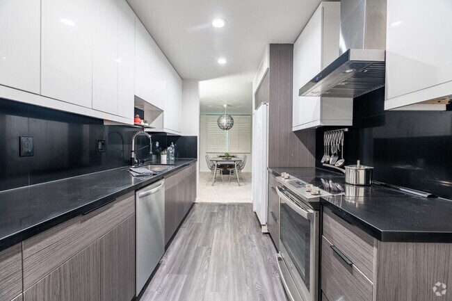 Building Photo - Modern 2-Bed, 2-Bath Corner Condo at Prime... Unit 212