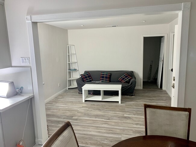 Living room set up during remodel - 720 N Walnut Ave