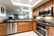 Kitchen overlooking living room/dining area room - 1951 N Beachwood Dr Condo Unit 203