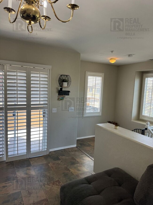 Photo - Charming End-Unit Condo with Modern Amenit...