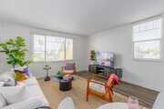 1BR, 1.5BA - 865SF - Living Room - GEMA