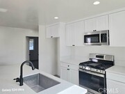 Photo - 1354 E 94th St Townhome