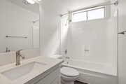 Bright and thoughtfully-designed bathrooms made for daily ease. - Palms Apartments