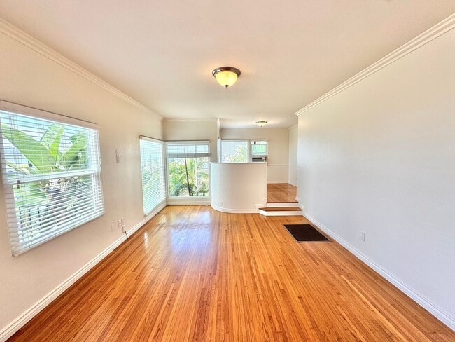 Photo - 3bd/1ba OB Home with OCEAN VIEWS! Hardwood floors, fenced yard, garage, laundry!