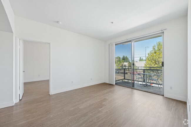 2BR, 2BA - 1090SF - Living Room - Northpoint Apartments at CSUN