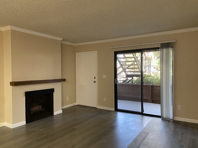 view of patio from living room - Bay Timbers Apartments