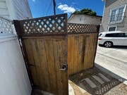 Laundry room located in building where the white car is parked - 1814 Pacific Beach Dr