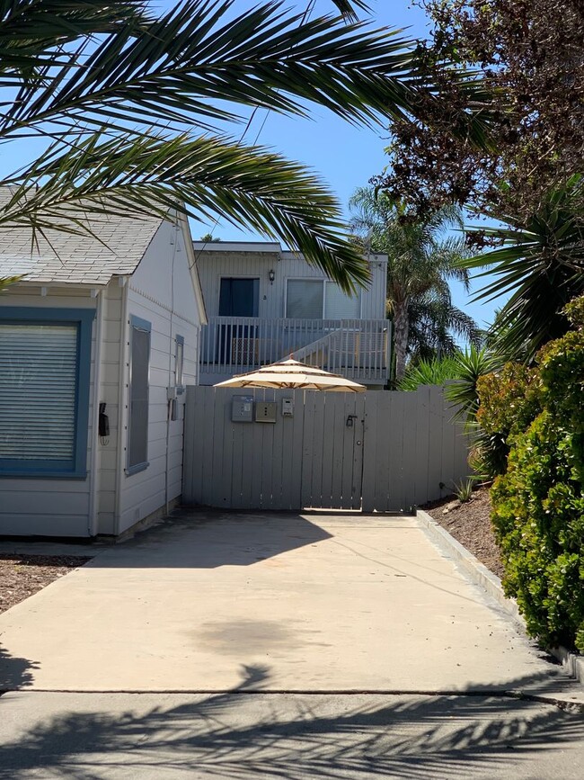 Photo - Cozy 1 bedroom cottage beach close with a yard, off street parking and a garage. Pets allowed