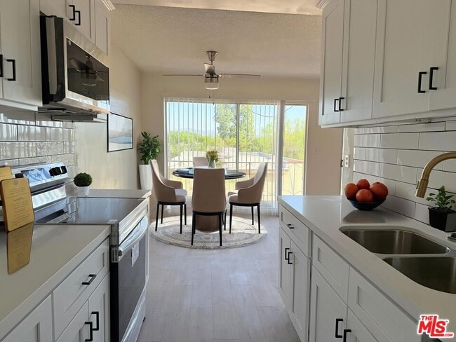 Photo - 10200 De Soto Ave Unit 327