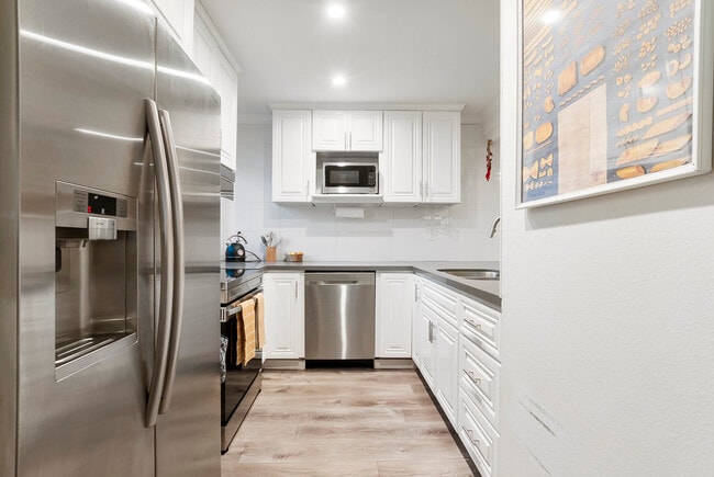 Unleash your inner chef in our fully equipped luxury kitchen, where culinary dreams come to life. - 4110 Mount Alifan Pl Unit 4110 Mt Alifan Dr 92111