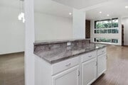 From kitchen looking towards dining/ living room. This is a GREAT Floor Plan for entertaining! - 10315 Missouri Ave Townhome