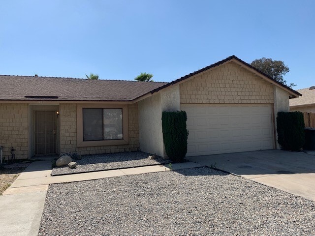 Building Photo - Redlands Home with NEW Paint & Tile Throughout