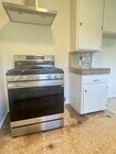 New Samsung stainless range/convection oven w/chef's hood above - 8616 McConnell Ave Unit 8620