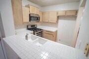Photo - COMING SOON! 2-Bedroom Condo with some Uti... Unit 211