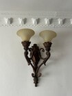 Close-up view of the right iron wall sconces on dimmer switches. - 1859 1/2 Pandora Ave Unit 1