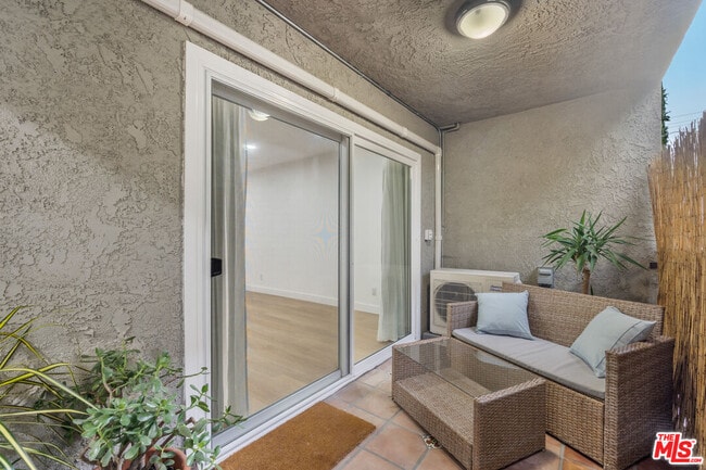 Building Photo - 9005 Cynthia St Unit 116