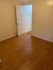 1 Bedroom / 1 Bath - Master Bedroom with two windows, plenty of light, and new floors. - 33 S Venice Blvd Apartments