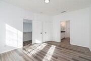 3BR, 3BA - 1,239SF - Primary Bedroom - Parkside Villas