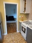 View from kitchen to living room - 501 S Church Ln House