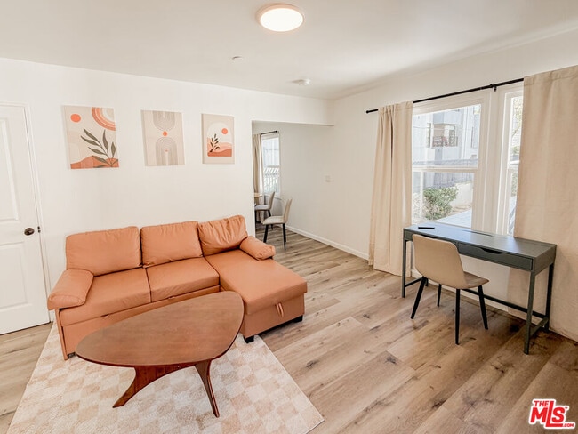 Building Photo - 6136 Carlos Ave Unit 1/2