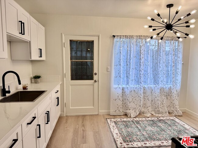 Photo - 1540 W 60th St Unit 2