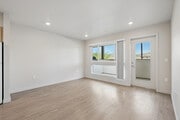 3BR, 2BA - 1044SF - Living Room - Juniper Grove