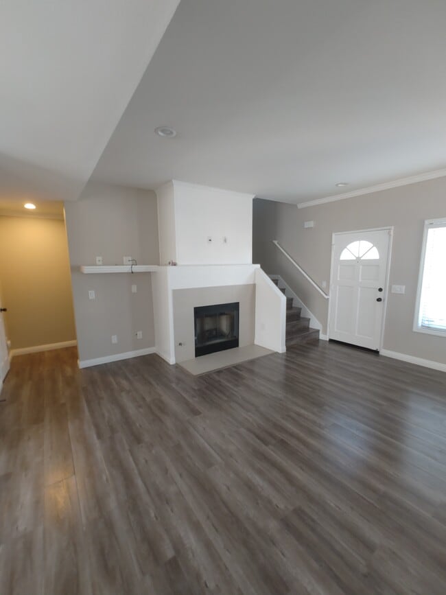 Living room/Fireplace - 357 W Wilson St Unit Townhome #A