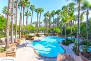Take a dip in our sparkling pools - The Grand Costa Mesa Apartments