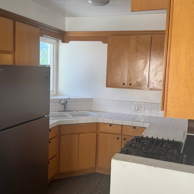 View of kitchen from dining area - 1756 N Normandie Ave Unit F