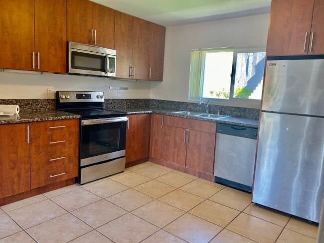 Kitchen with stainless steel appliances - 5040 A St #10 Unit 10