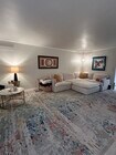Living room (also has a fireplace) - 11911 Magnolia Blvd Condo Unit 16