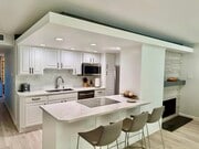 Beautifully remodeled Kitchen w/ Quartz, GE Profile stovetop and stainless steel appliances - 72 The Strand Unit OCEANFRONT