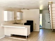 Kitchen view to front door Apt B - 619 W Provential Dr Unit Apt B