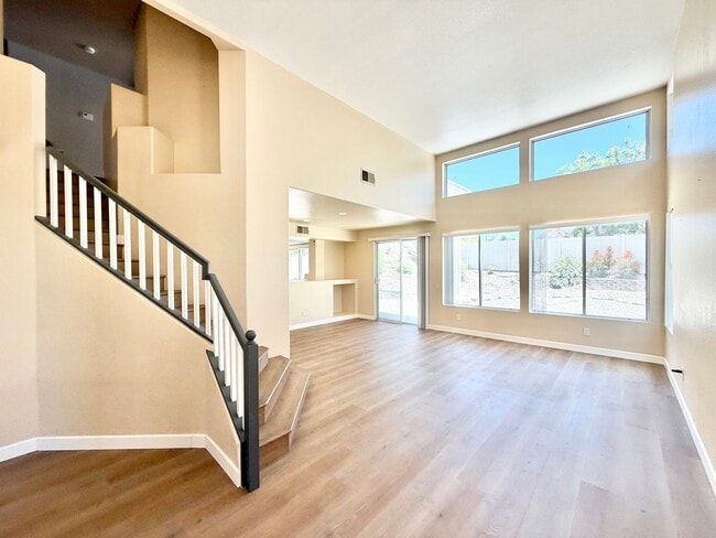 Photo - Spacious 5 Bedroom Home with 3 Car Garage & Primary Suite Balcony