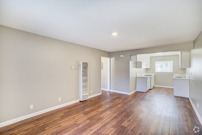 2BR, 1BA - 780SF - Living Room and Kitchen - Nicolet Apts