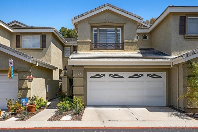 Building Photo - Carmel Valley 2BD/2.5BA Townhome w/ 2-Car Garage + Community Pool