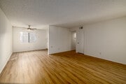 2BR, 2BA - 950SF - Living Room - Cape Cod Apartments