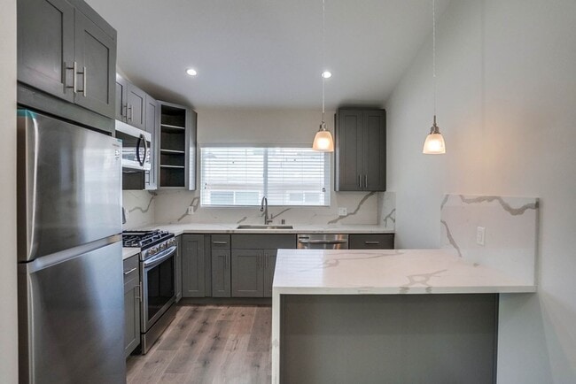 Photo - Retro Style Apartment Building with Pool a...