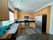 Photo - Spacious 3-Bedroom, 2.5-Bath Condo for Ren...