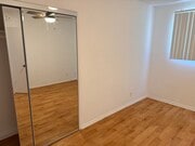 Bedroom with mirrored closets - 4451 Murietta Ave Unit #17