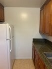 Full Size Refrigerator with overhead Storage - 4302 Elm Ave Unit 3
