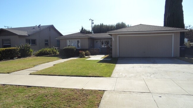 Building Photo - Single Story 4BR 2BA Home 2 Car Garage